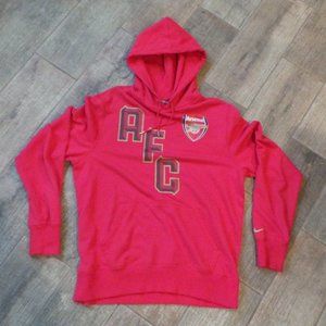Nike Arsenal F.C. pocket-ed pullover hoodie.